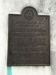 Placard at the Washington Avenue entrance to Lafayette Cemetery No. 1