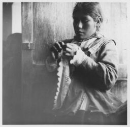 Young Vicosina woman crocheting