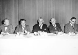 Some of those sitting at the head table for the 46th annual luncheon of the League for Industrial Democracy, at the Hotel Commodore in New York, March 31, 1951, include (l-r) Ralph Wright, David Dubinsky, A. J. Hayes, William Green, and Ralph J. Bunche.