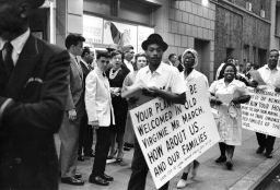 African American members of ILGWU Local 222 picket "Mr. March."