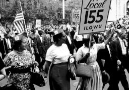 ILGWU Local 155 members march in a parade.