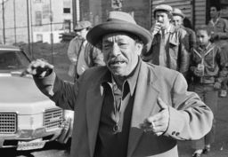 Unidentified man at a protest of the film "Fort Apache, The Bronx"