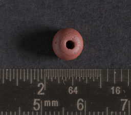 Red drawn glass bead