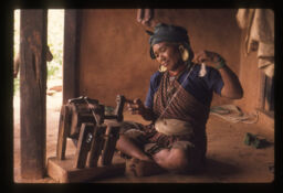Nhanu Tamang charkha ma uni kattatai (न्हानु तामांङ चर्खमा उनी कत्तै / Nhanu tamang spinning Wool in Charkha machine)