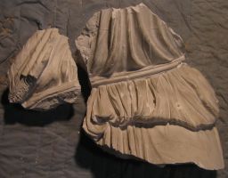 Fragment of draped figure with girdle