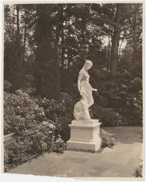 Bulkley "Rippowam" garden, statue of woman and dog from side