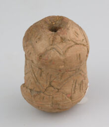 Bobbin or spindle whorl with constriction, double incised lines for line effect