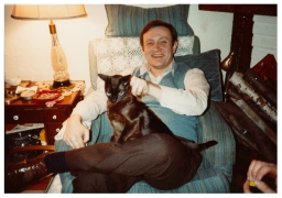National Gay Task Force board member sitting with black cat