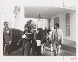 Charlie Brydon, Jean O’Leary, and Bruce Voeller, Frank Kameny, Myra Riddell, George Raya leaving the White House after meeting with Midge Costanza