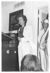 Woman speaking at event