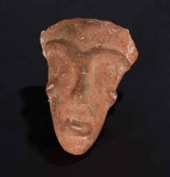 Hollow podal element in the form of an anthropomorphic head 