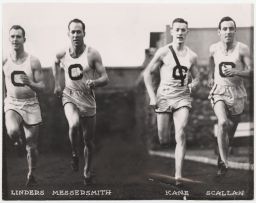 Robert Kane and others running in cross country outfits.