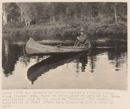 Edward Roberts in canoe on Trout River