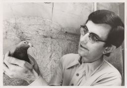 William T. Keeton Holding Pigeon