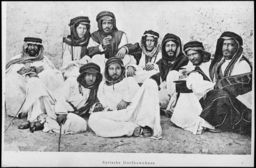 A group of Syrian men, seated