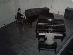 Two piano players
