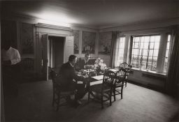 Perkins and Rockefeller at a table in dining room