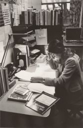 Hotel School Office, With Woman Reading at Desk