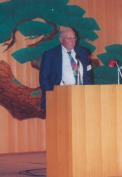 David Y. Cooper (born 1924), M.D. 1949, at the podium
