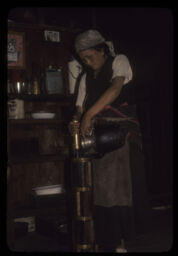 Mahilale suchya banaudai gareko (महिलाले सुचिया बनाउदैं / woman churning suchya (kind of Tebetian tea))