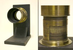 Lens, mounted in holder, J.H. Dallmeyer, London, No. 34849. Probably a projector lens.