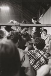 Daniel Berrigan, hand on railing