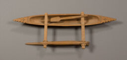 Wooden outrigger canoe (paopao) and paddle model