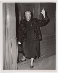 Ethel Waters waving out of train