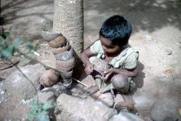 Child playing in courtyard