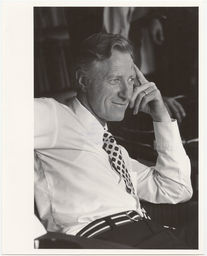 Frank H. T. Rhodes sitting and smiling