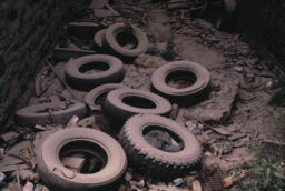 Tires in vacant lot, West End Avenue