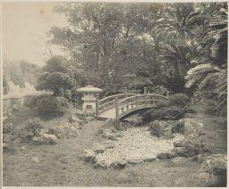 Wooden bridge in garden at Horne residence