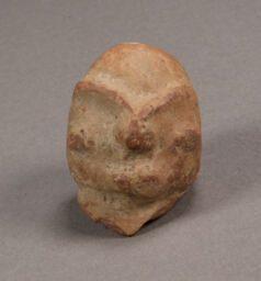 Hollow head fragment with raised modelled face and knobby back of head
