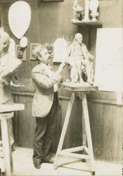 Sculptor John J. Boyle working on Statue of Benjamin Franklin (now in front of College Hall)