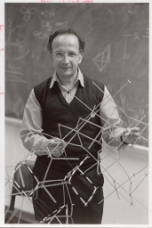 Professor Roald Hoffman holding a molecular model