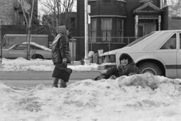 Children playing in snow near United Bronx Parents