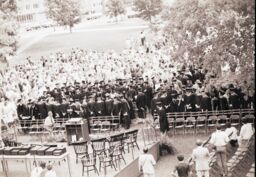 Students standing during Commencement