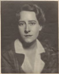 Large portrait photograph of Olive Tjaden.