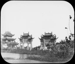Traditional Chinese pailou gateways, next to a pagoda, near Nanking (Nanjing), China