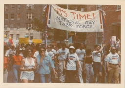 Marchers with It's Time banner for the National Gay Task Force