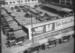 Parking Lot with Tak Hom a Biscuit Advertisement