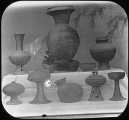 Nine ceramic pottery pieces from burial, undated