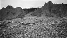Sculptured gravel cliff - McBride's terminus. Muir Glacier