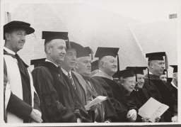 Sir Eric Ashby (left) and Cornell president James A. Perkins (second left) next to Adlai Ewing Stevenson II at Centennial celebration