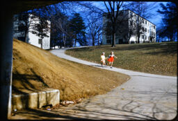 Children running down a pedestrian pathway (Greenbelt, Maryland, USA)