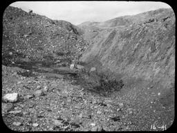 Yakutat Bay: New fault scarp. Upthown on N. 1905-135 1500 USGS