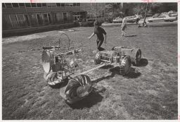 Student-made vehicle and student in front of Upson Hall.