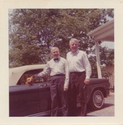 Photo of Edward Crouse and Edward J Wormley with their corgi.
