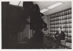 Two men filming a broadcast about the Willard Straight takeover.