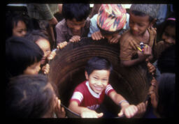 Ketaketiharu kheldai (केटाकेटीहरु खेल्दै / Children Playing in the Drum)
